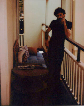 Corridor study Hogan Ellis standing in a narrow corridor during the Kingdom of Forgetting photo session